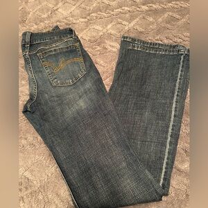 Women’s Wrangler Bootcut jeans size 7 with 36 inch inseam.